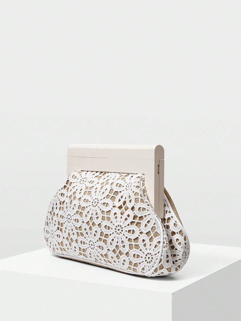 Bolsa Clutch Com Design Floral Oco - tassiniSKU_1714930547586_533tassinitassini1714930547586/167Tamanho ÚnicoBolsa Clutch Com Design Floral Oco