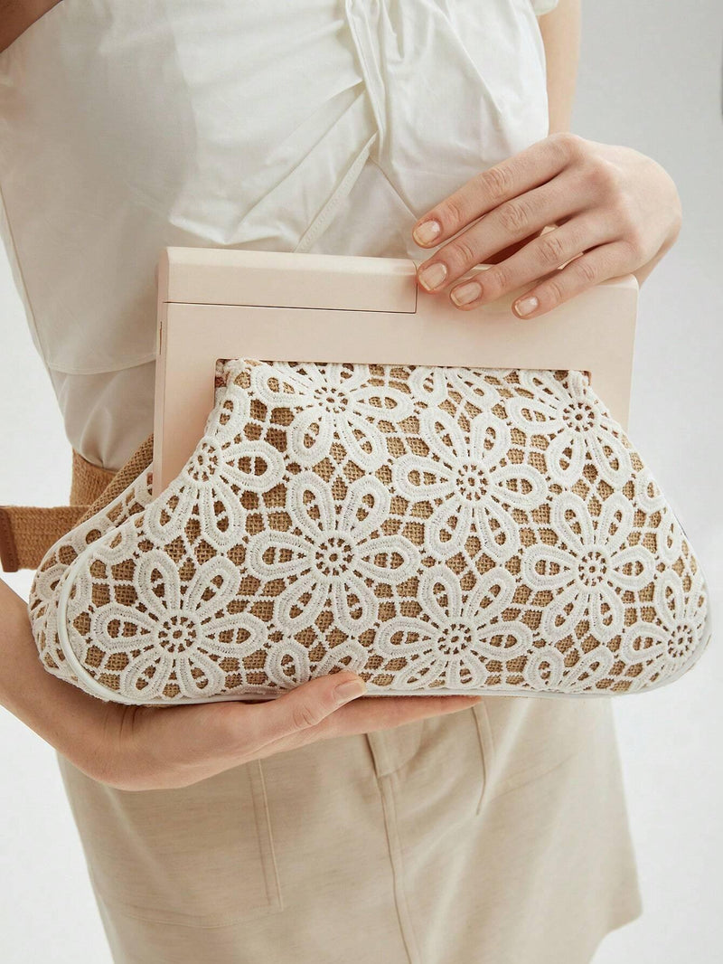 Bolsa Clutch Com Design Floral Oco - tassiniSKU_1714930547586_533tassinitassini1714930547586/167Tamanho ÚnicoBolsa Clutch Com Design Floral Oco