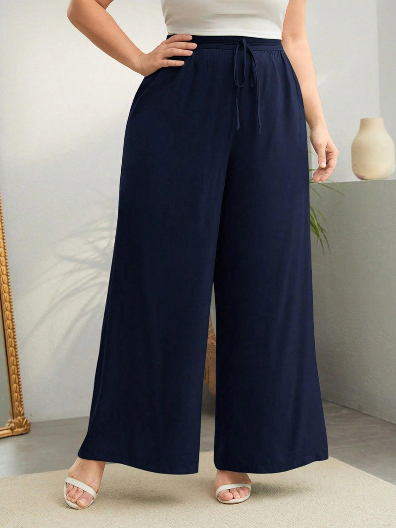 Calça Wide Feminina Plus Size - tassiniSKU_1713757460297_547tassinitassini(A088)1713757460297/439Calça Wide FeminaAzul MarinhoGCalça Wide Feminina Plus Size